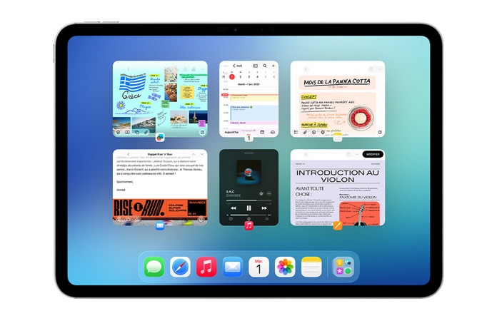 Un iPad, orientation paysage, affiche six fenêtres ouvertes disposées sur deux rangées, dont l’app Calendrier, l’app Notes, Apple Music et Safari